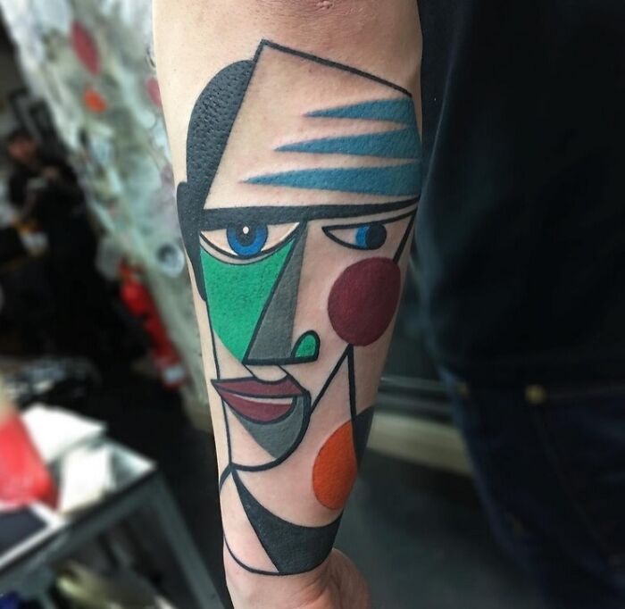 Abstract and colorful Face hand Tattoo 