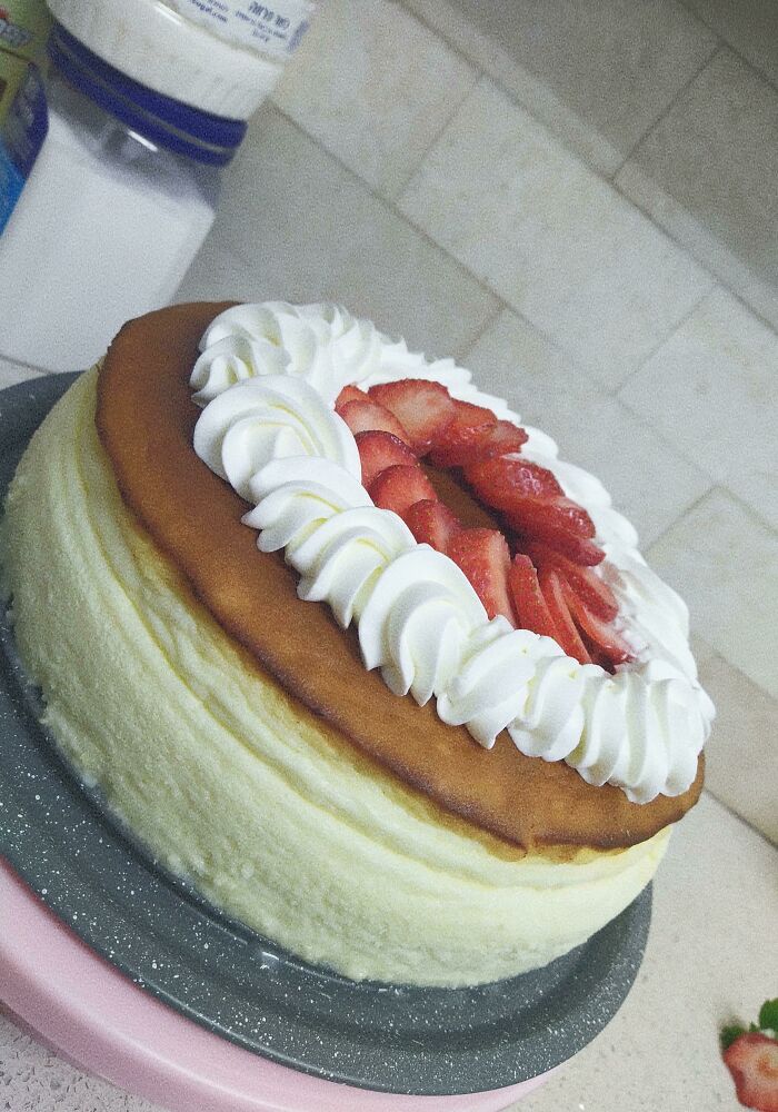 Cheesecake With Whipped Cream & Strawberries