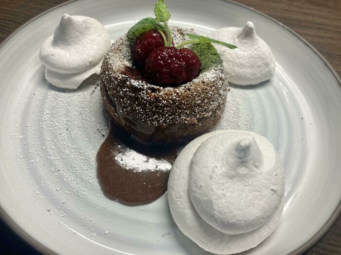 Molten Lava Cake With A Hint Of Coffee And Fresh Raspberries For Chocolate Lovers 🌋