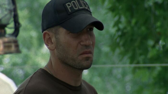 Shane Walsh looking forward while wearing a hat