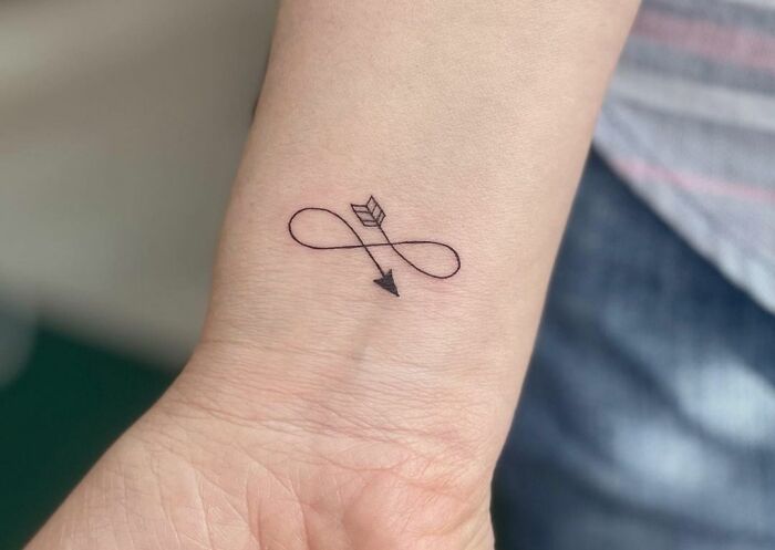 infinity arrow tattoo