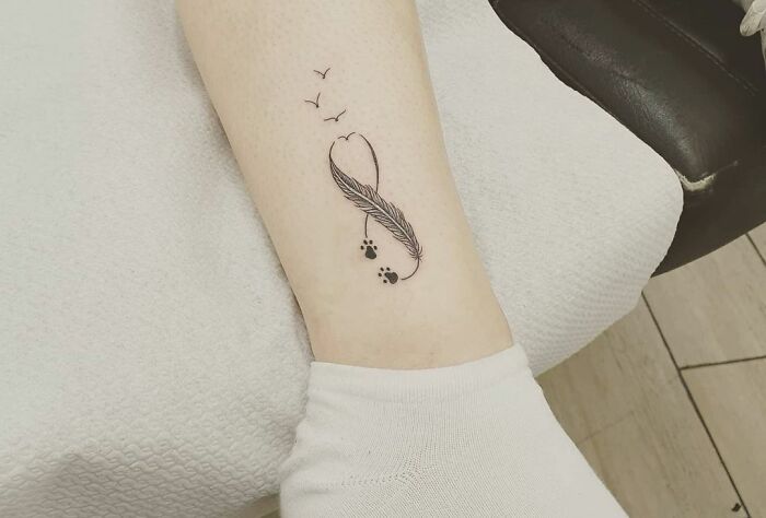 infinity tattoo on the leg