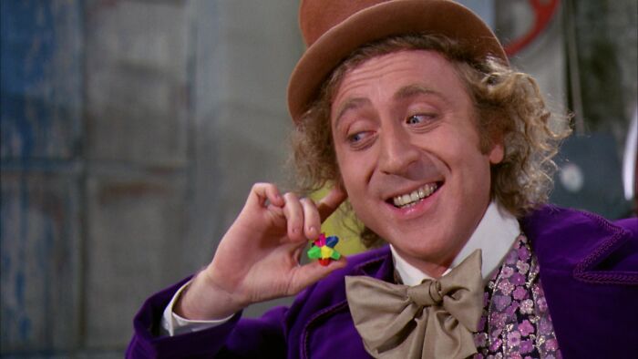Willy Wonka holding candy 