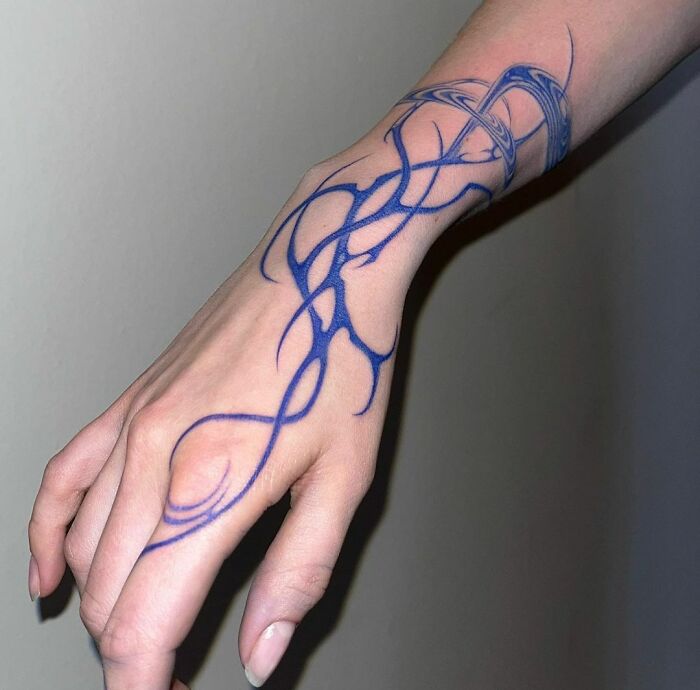 Blue Abstract wrist and palm Tattoo