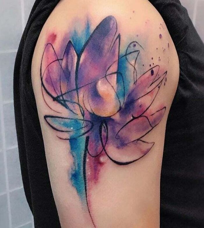 Abstract and colorful Watercolor Lotus arm Tattoo