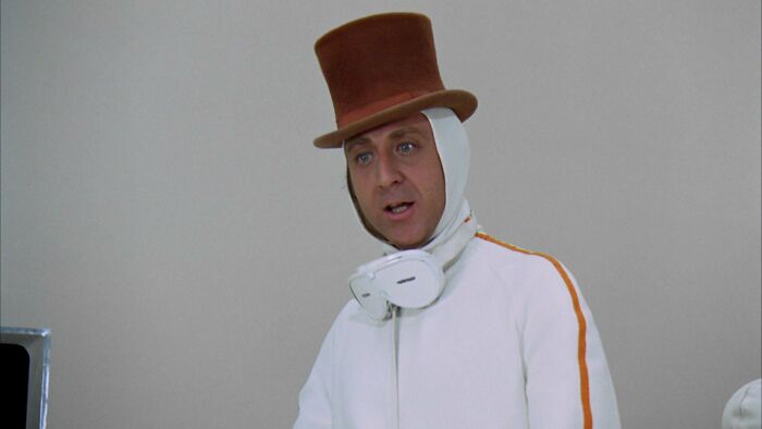 Willy Wonka wearing white costume 