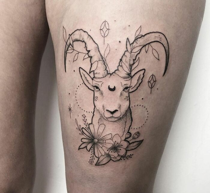 Capricorn thigh tattoo