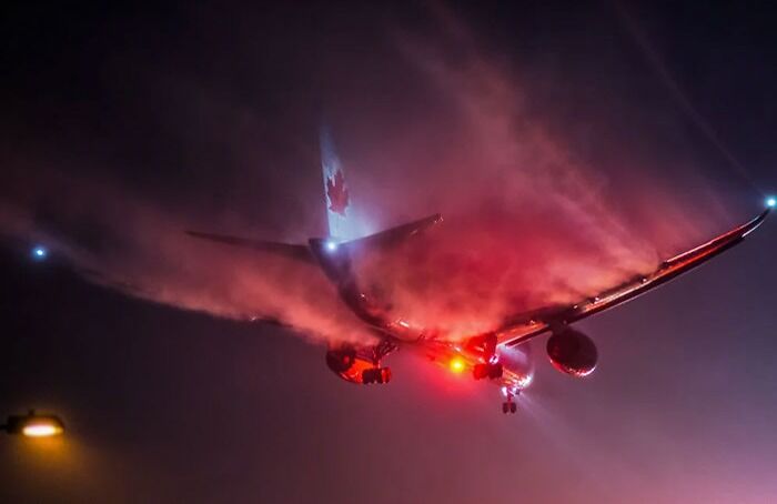 An Air Canada 787 Bursts Through The Mist In Stunning Fashion At Heathrow