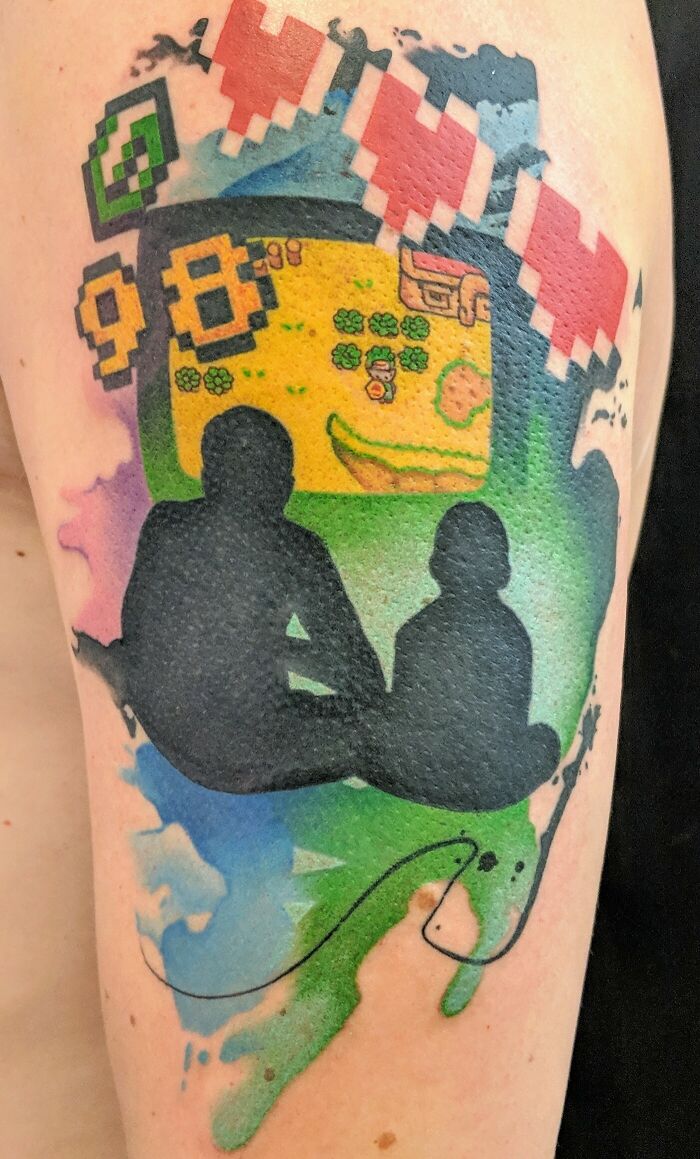 Gaming dad and son memorial tattoo