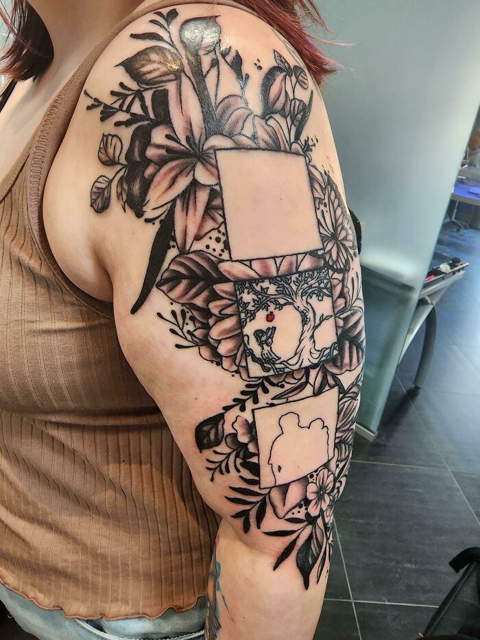 Floral memorial arm tattoo