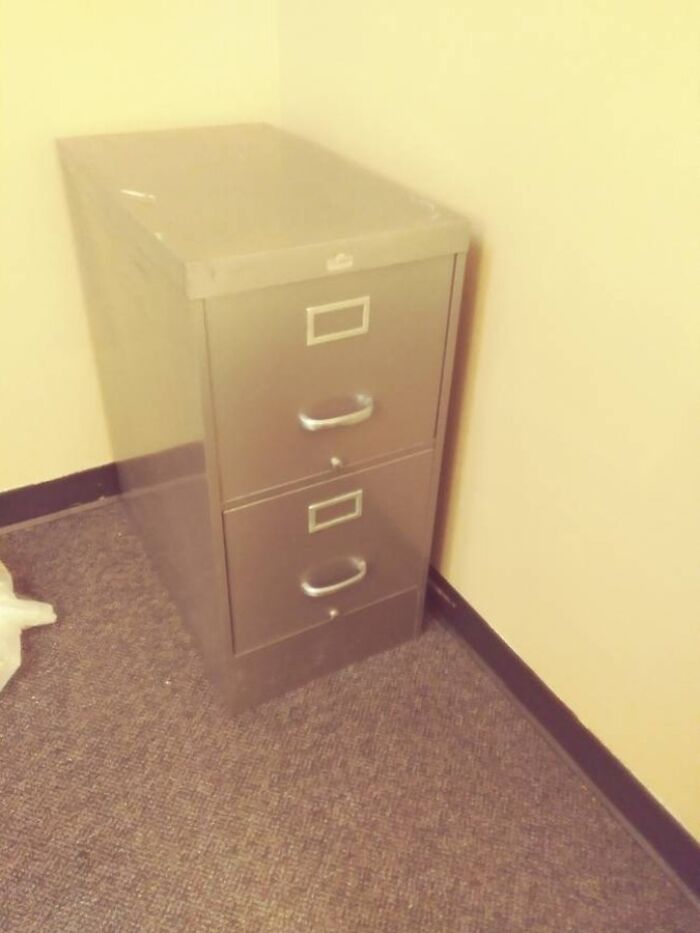 The Shine On This Filing Cabinet Makes It Look Like It's Fading Away