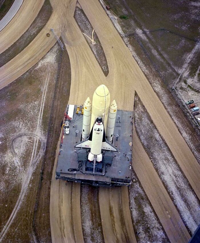 Space Shuttle Columbia On Its Way To Complex 39 Pad A To Be Launched As Sts-1 December 29th 1980. The Crawler Transporter That Carries It From The Vehicle Assembly Building Weighs 6 Million Pounds