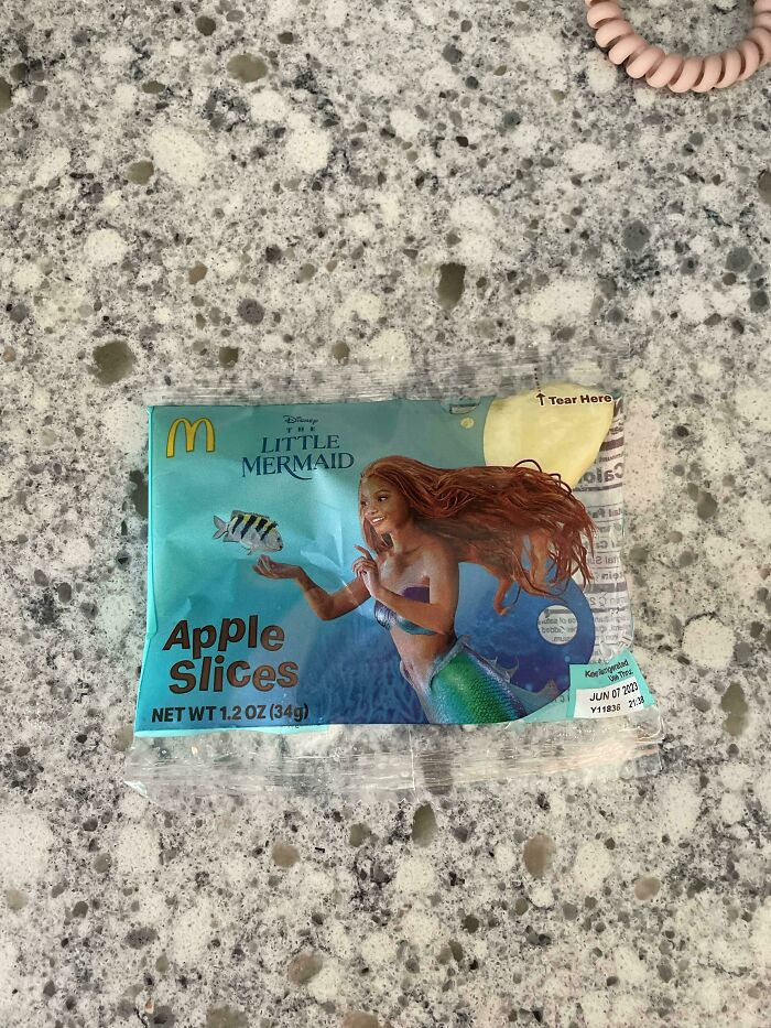 One Apple Slice In This Plastic Baggie, Advertising A Movie About The Ocean…