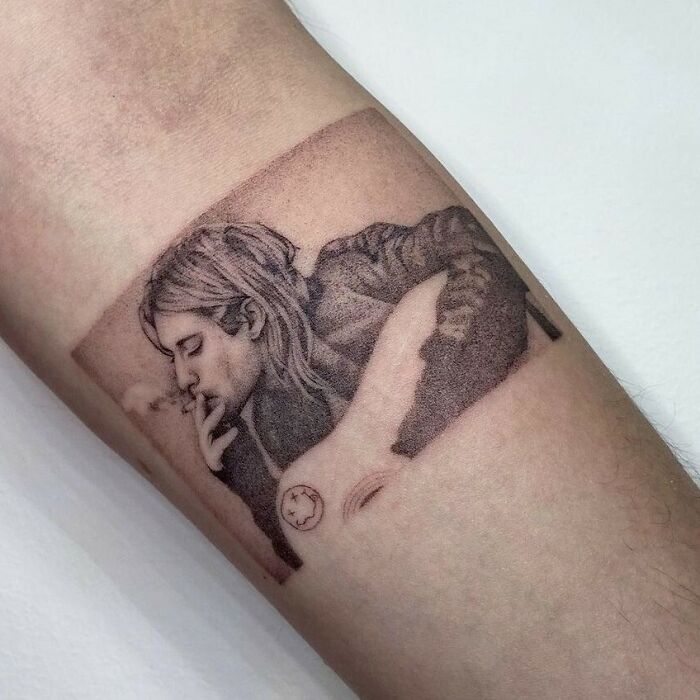 Realistic Kurt Cobain smoking cigarette tattoo