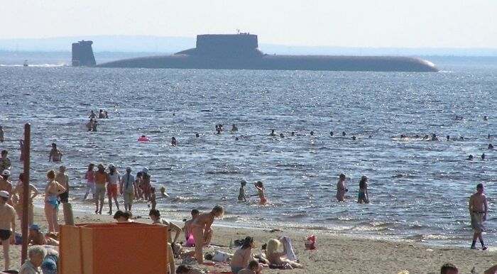 A Typhoon Class Submarine Passing Close By A Beach In Russia
