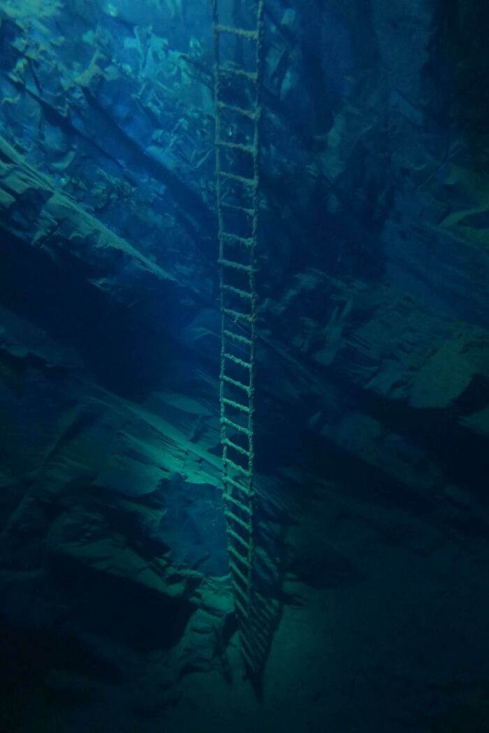 A Ladder In A Flooded Quarry