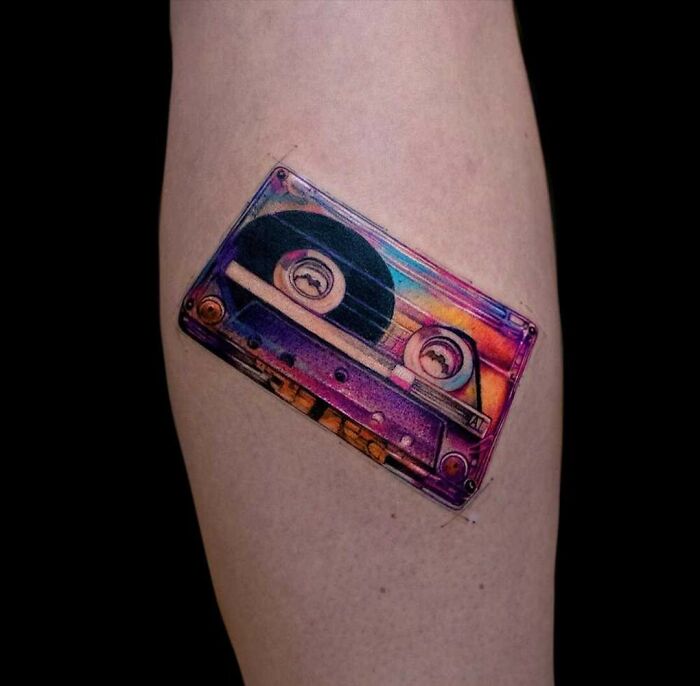 Realistic colorful cassette tattoo