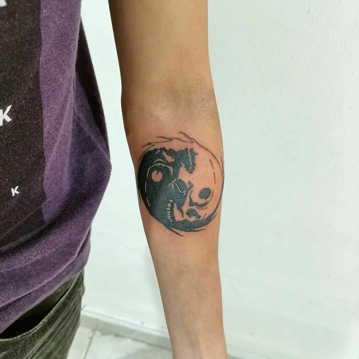 Yin yang of skulls tattoo