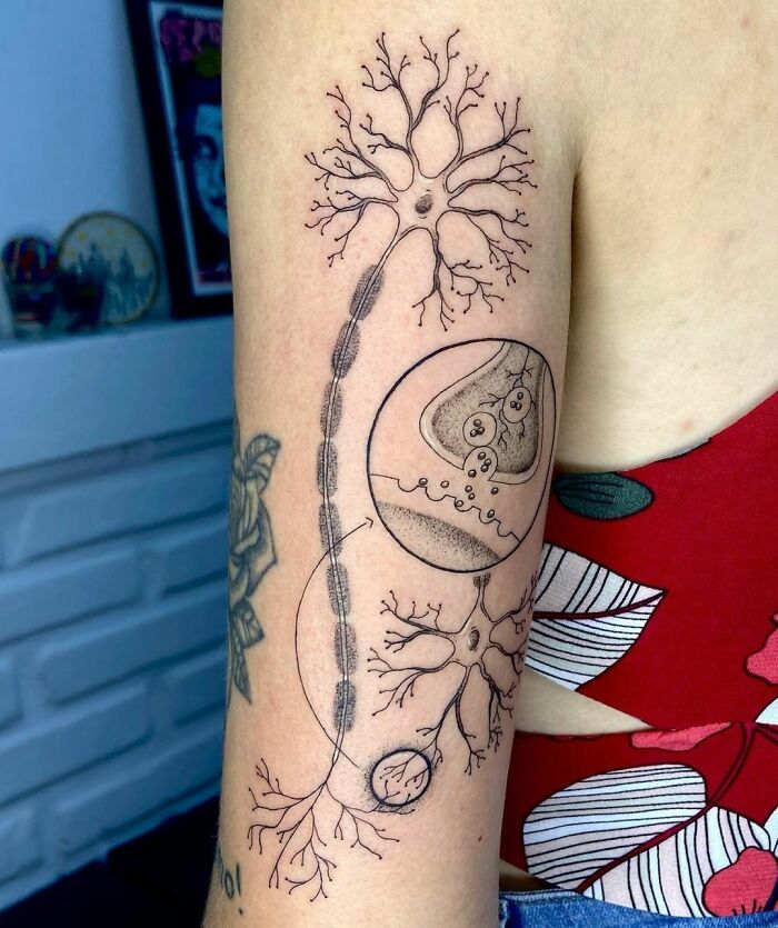 Neuron tattoo on arm