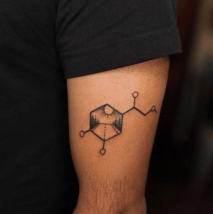 Black simple chemistry molecule tattoo on arm