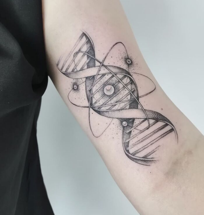 DNA science tattoo on arm