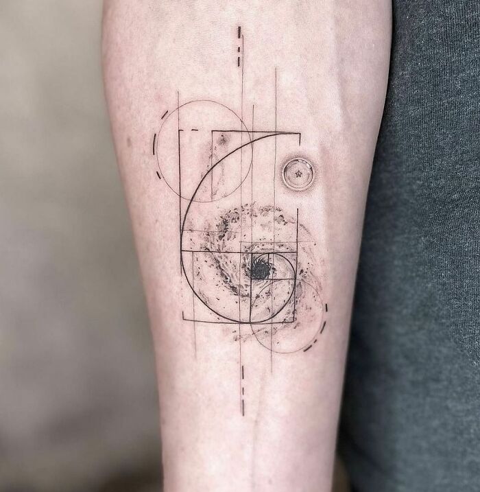 Fibonacci black hole arm tattoo