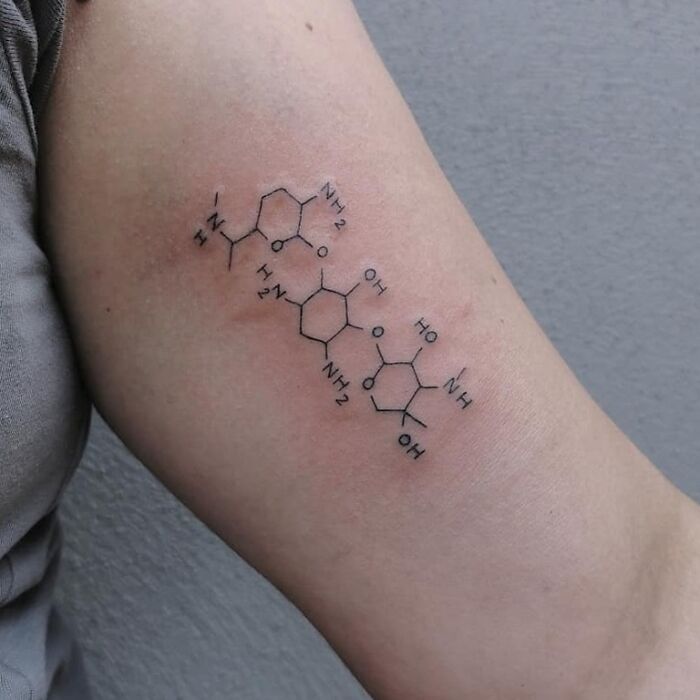 Chemistry molecule tattoo on arm