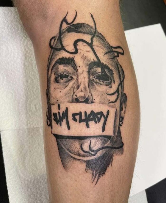 Eminem Slim Shady arm Tattoo