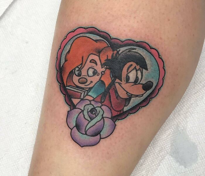 90's goofy and girl in the heart shape and with flower arm Tattoo