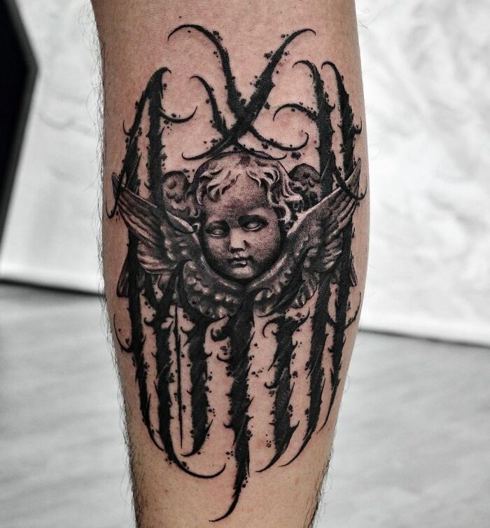 Stylized Lettering With A Cherub Tattoo