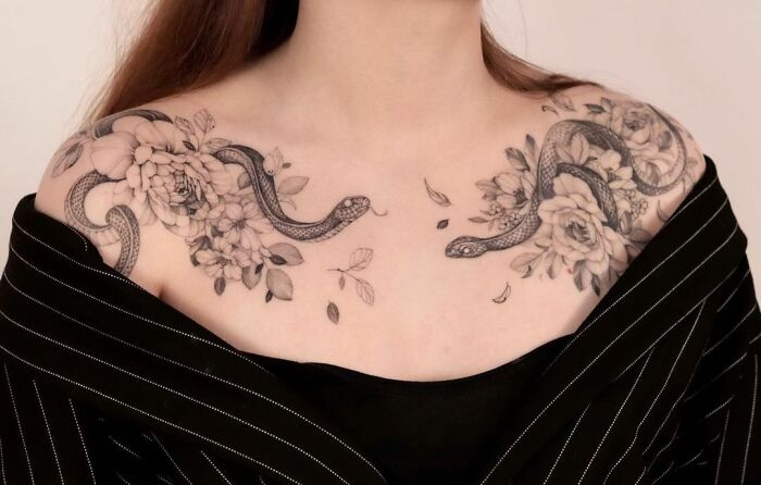 snake chest tattoo