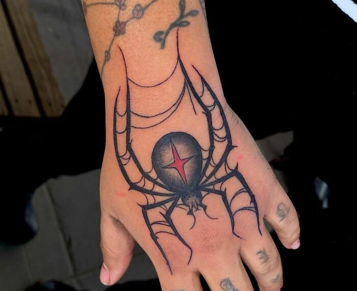 Black Widow Hand Tattoo