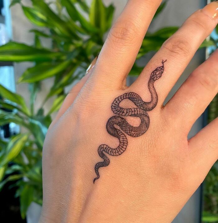 Tattoo uploaded by The INKsanity • Tiny wrist snake fineline dots • Tattoodo