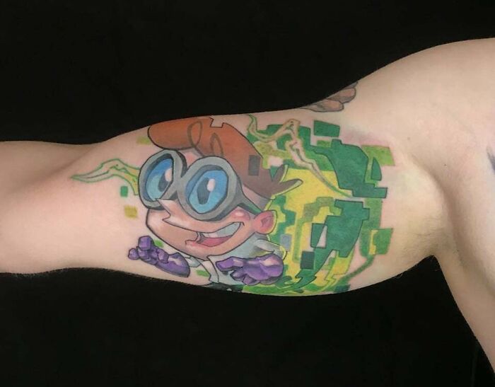 Dexter Coming Out Of A 8-Bit Portal arm tattoo