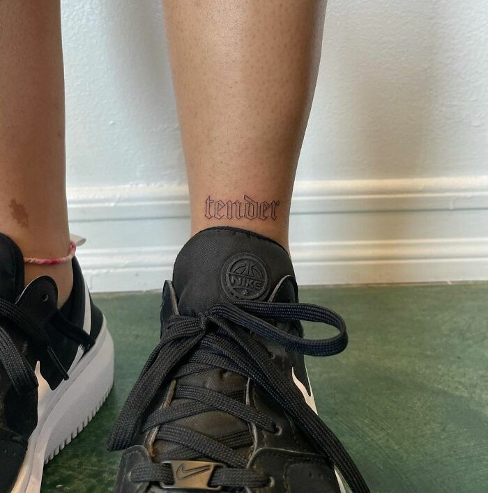 Text ankle tattoo