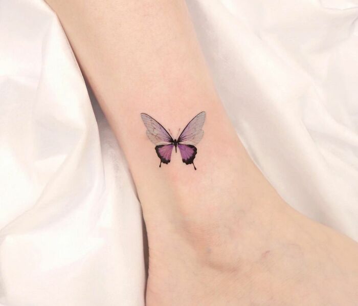 Small butterfly ankle tattoo
