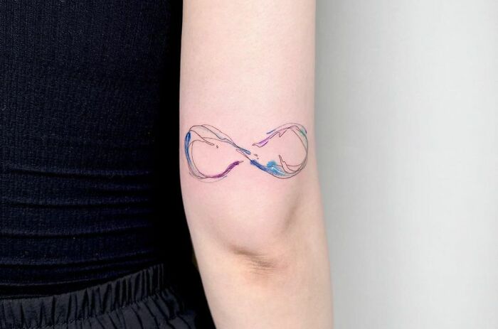 infinity colorful wave tattoo on hand