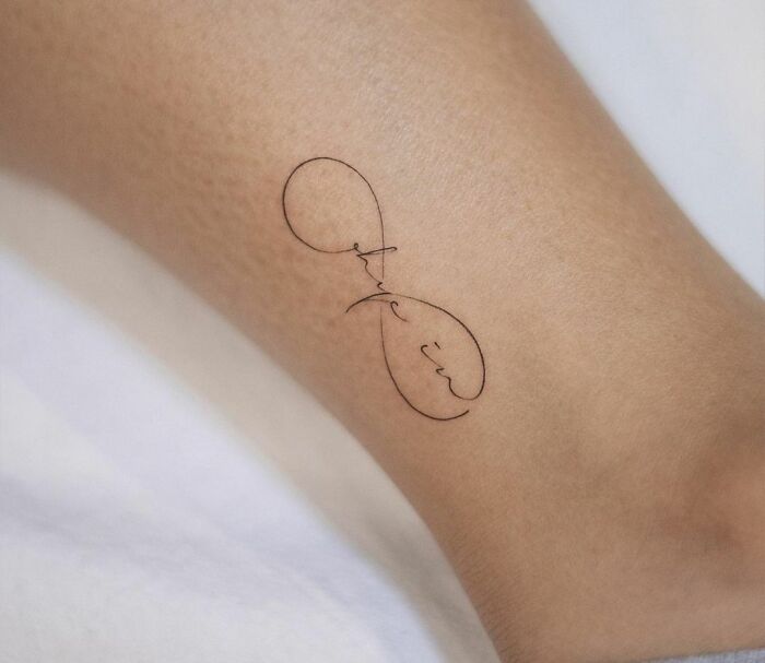 infinity tattoo on the leg