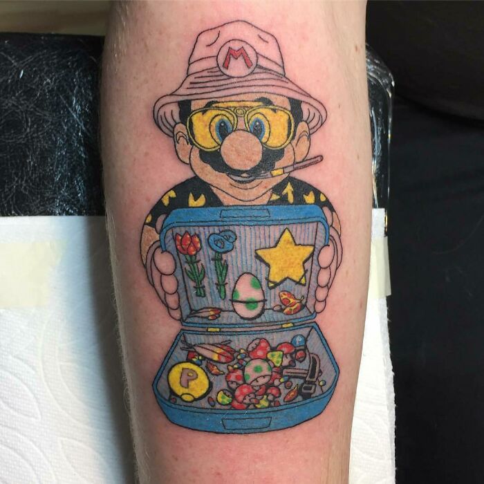 Mario Hunter with suitcase full of prizes Tattoo