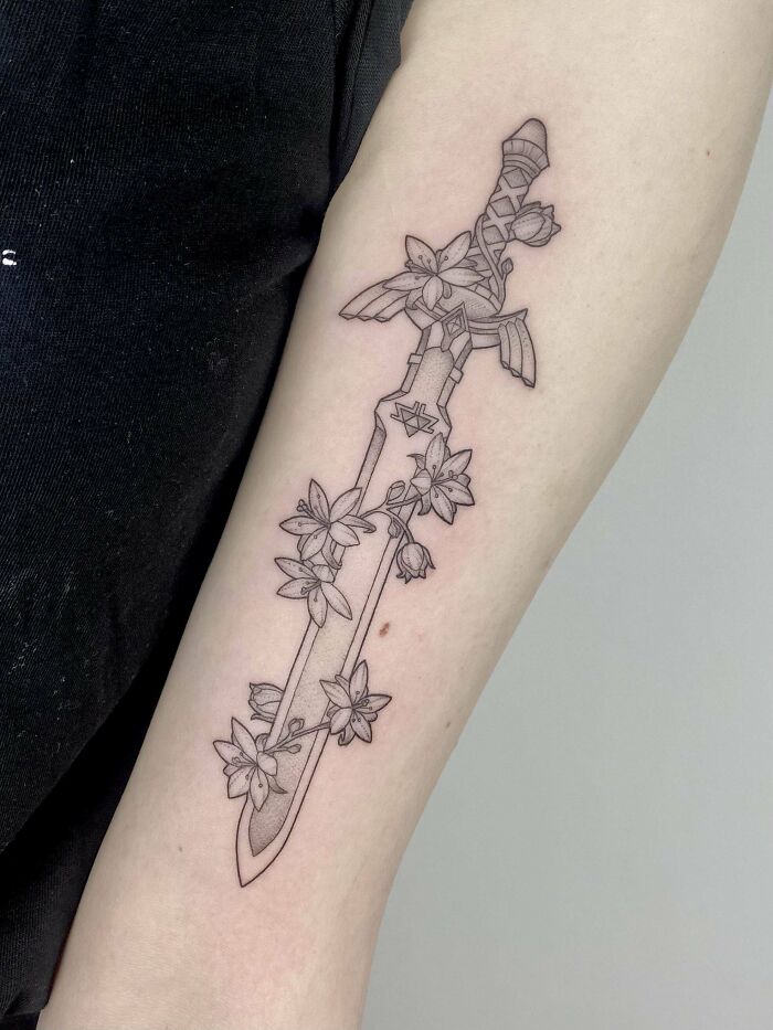 Zelda master sword with flowers tattoo