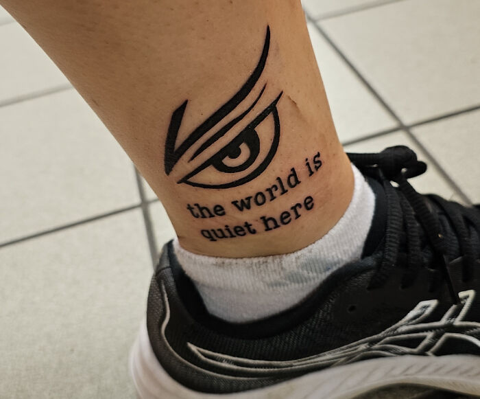 Eye ankle tattoo