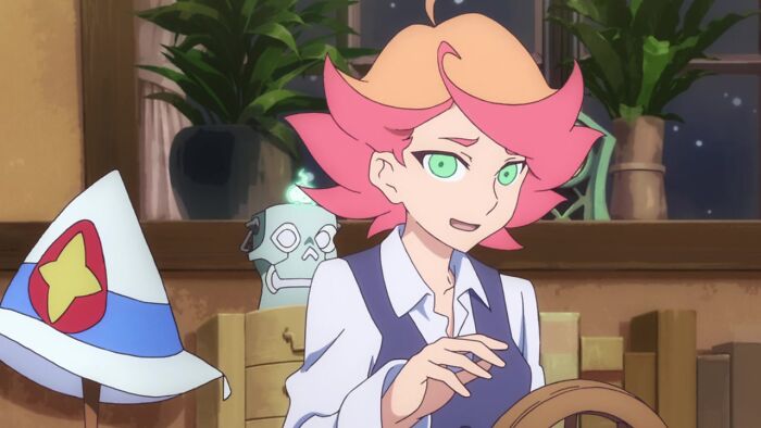 Amanda O’Niell looking and smiling from Little Witch Academia