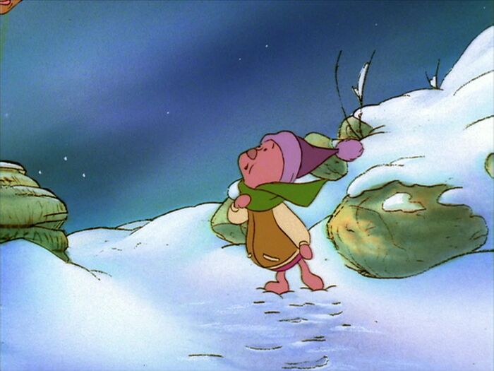Piglet from Winnie the Pooh walking during winter time