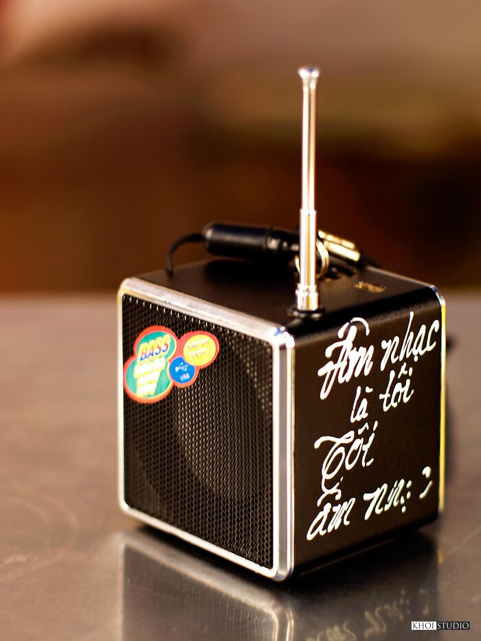 Close-Up Photo Of A Speaker Used To Listen To Music And Listen To The Radio. The Owner Of The Speaker Wrote Beautiful Words On The Case