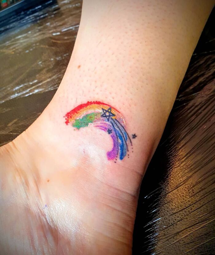 Rainbow ankle tattoo