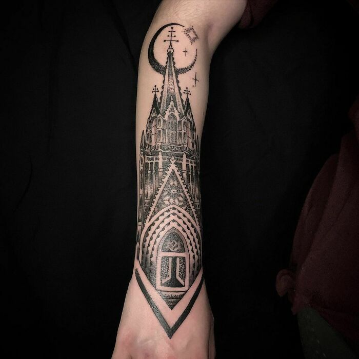 Large church forearm tattoo