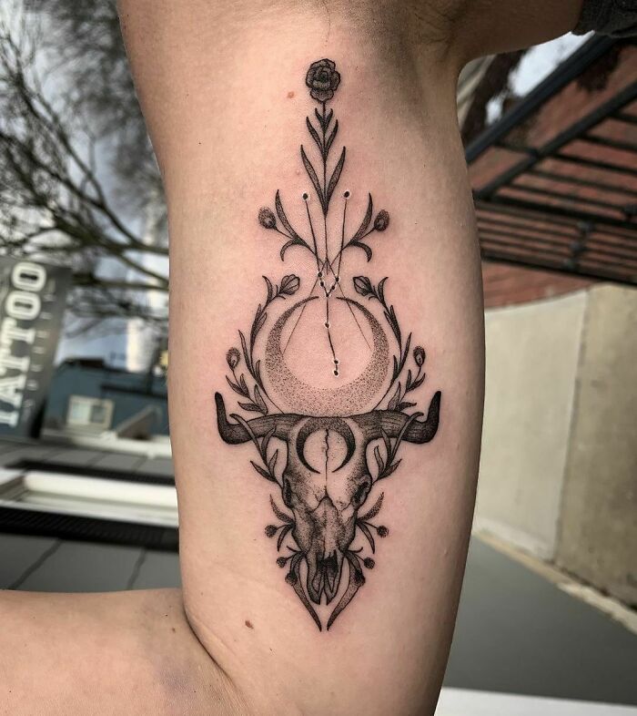 Floral Taurus arm tattoo