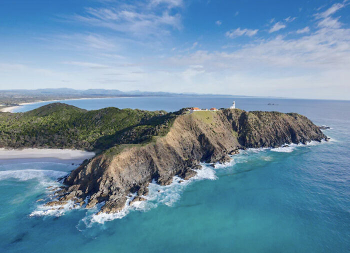 An Aerial Photograph Of Byron Bay's Iconic Lighthouse