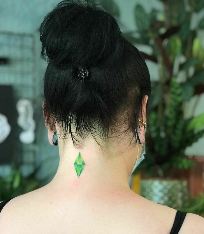 The Sims sign tattoo 