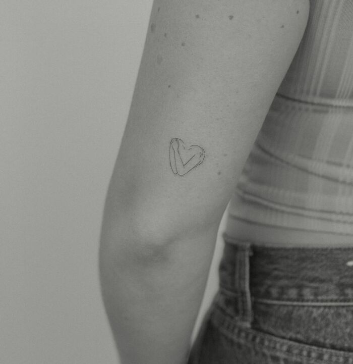 Self love tattoo on the elbow